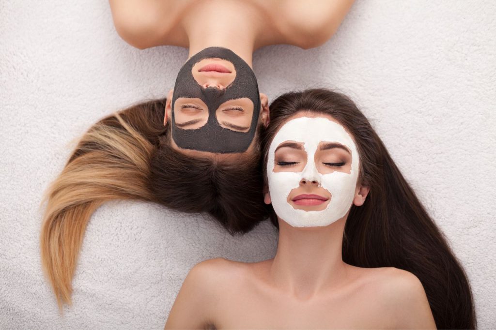 Two Teens receiving facial treatments for acne